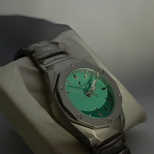HUBLOT DIAMOND CUT DATE WATCH, WITH AQUA DIAL