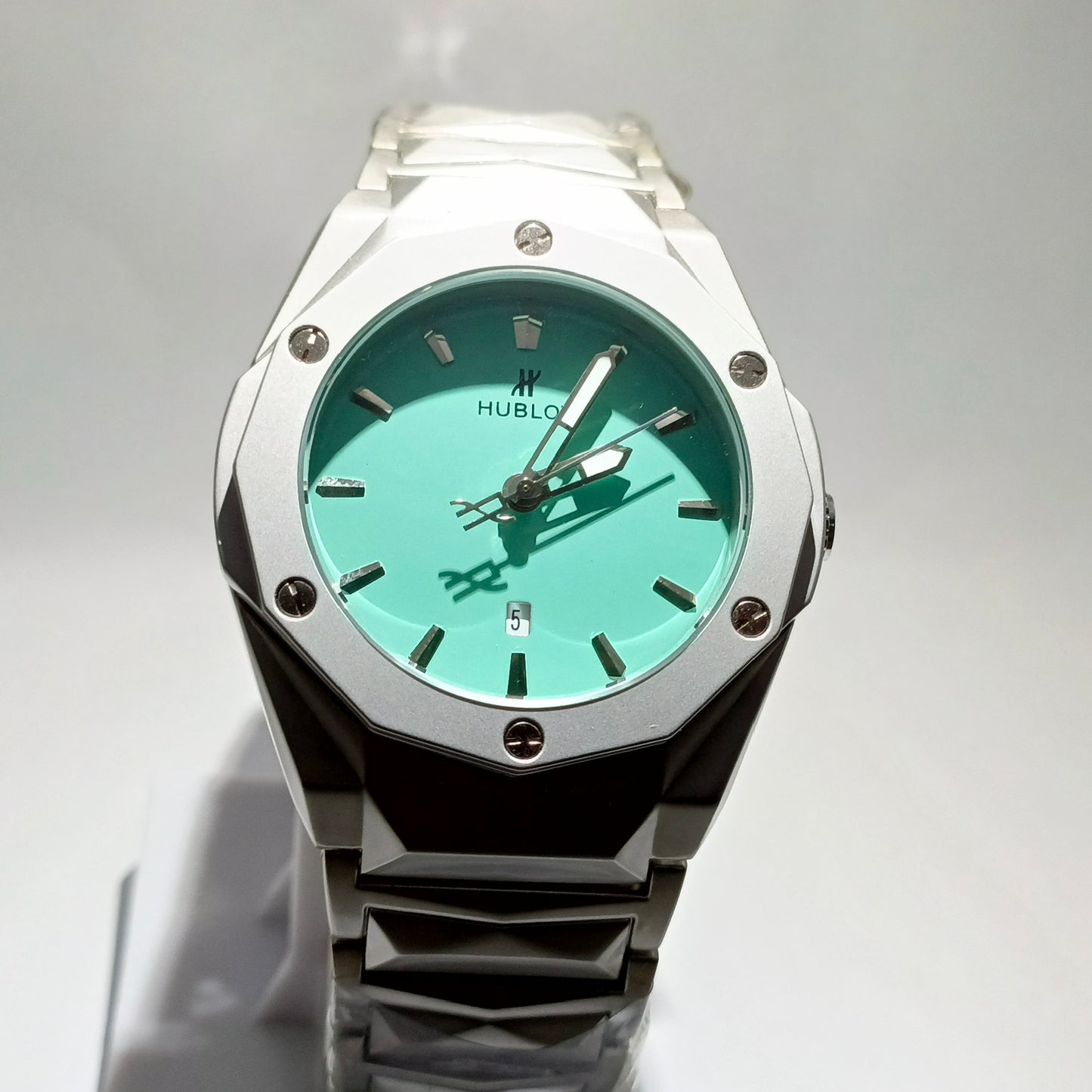 HUBLOT DIAMOND CUT DATE WATCH, WITH AQUA DIAL