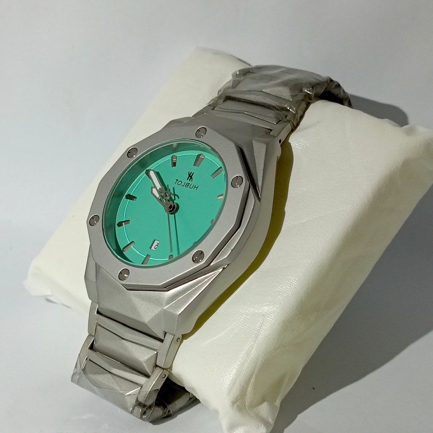 HUBLOT DIAMOND CUT DATE WATCH, WITH AQUA DIAL