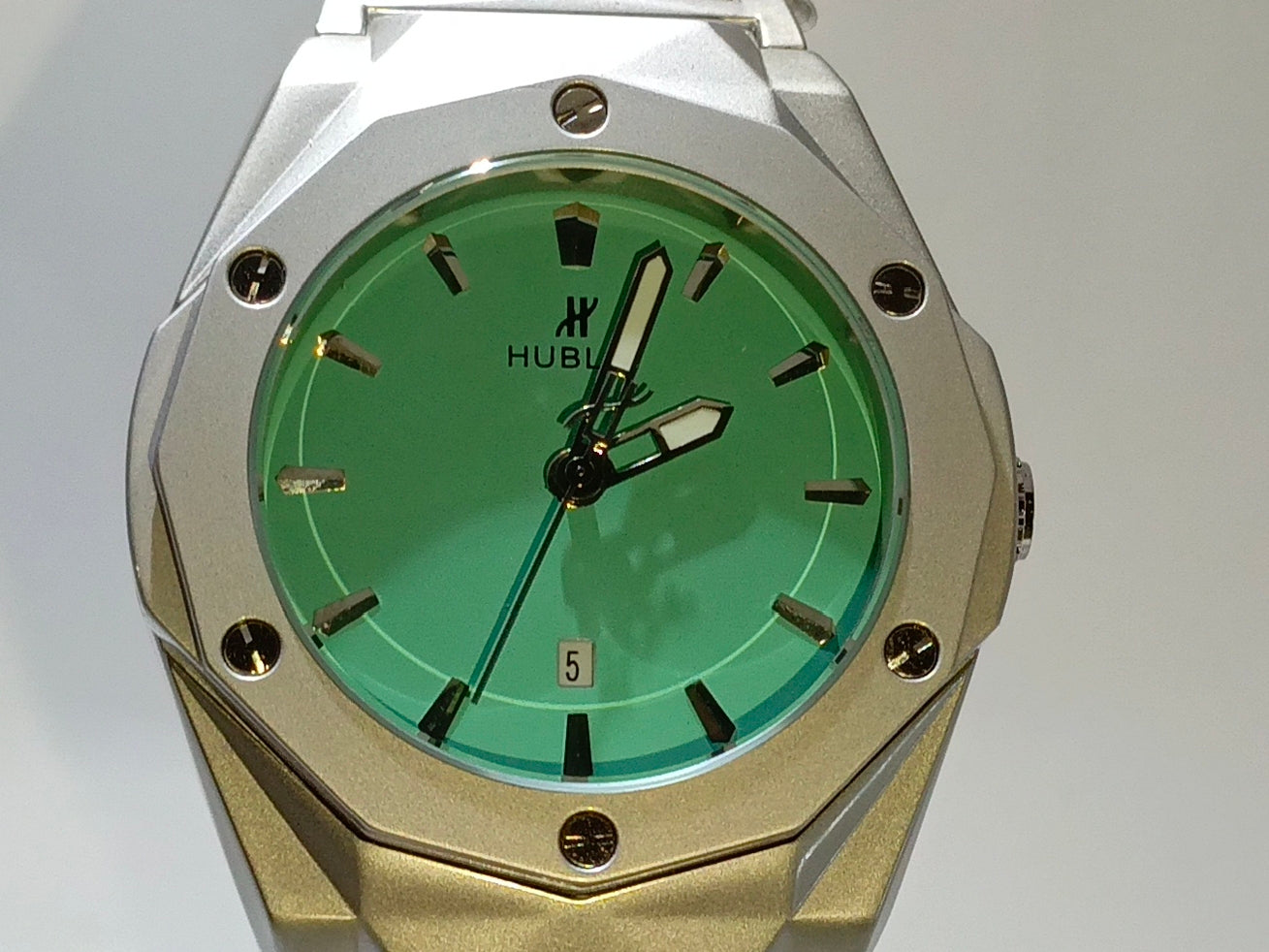 HUBLOT DIAMOND CUT DATE WATCH, WITH AQUA DIAL